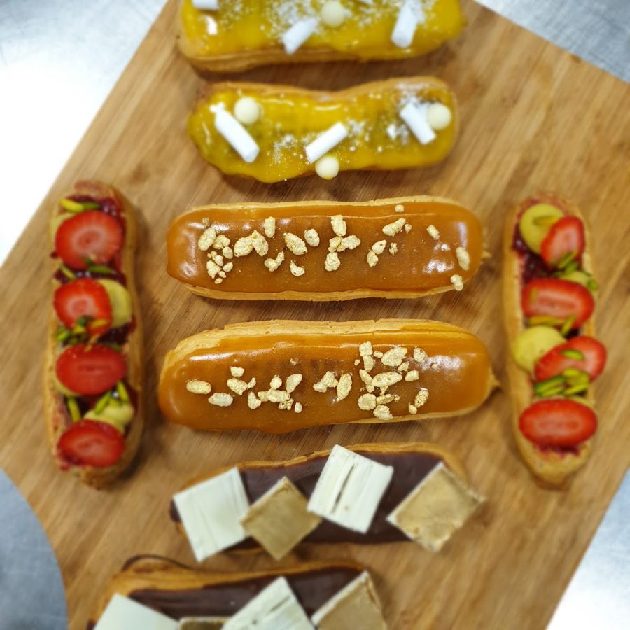 Custard and cream pastries with strawberries